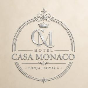 a sign for a hotel casa monroe with a crown at Hotel Casa Mónaco Tunja in Tunja