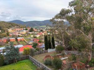 a view of a suburb with houses and trees at Enkindled Haven in Moonah