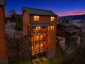 an aerial view of a house with a balcony at Indoor Pool Hot Tub, Pets Welcome, Arcade Games - Sleeps 14 in Pigeon Forge