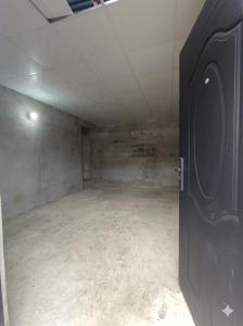 an empty room with a door open to an empty room at La parada de Emma in Las Lomas
