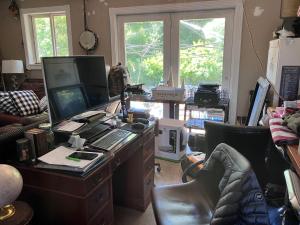 an office with a desk with a computer and a chair at Philomath place in Philomath