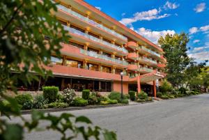 a building with a street in front of it at Kamchia Park Hotel - All Inclusive in Golden Sands