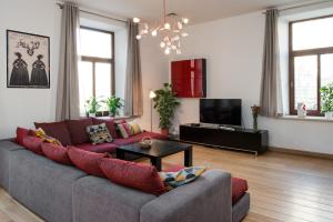 Televízia a/alebo spoločenská miestnosť v ubytovaní Style4rent Apartament Kazimierz