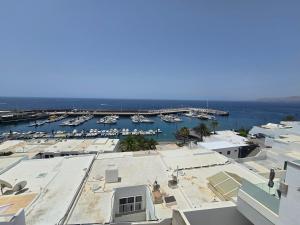 a view of a marina with boats in the water at Casa Memela 6 in Tías