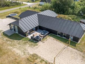 an overhead view of a house with a roof at Luxury Retreat in Vorupor in Snedsted
