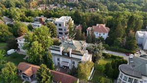 an aerial view of a town with houses and trees at Villa Dedinje in Belgrade