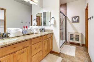 a bathroom with a sink and a shower at Hot Tub, Deck & Grill! Mtn Retreat in Show Low in Show Low +22 photos