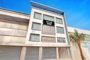 a building with a sign that reads rideo at Super Hotel O Kanode Gate Formerly Hotel Dhruv in Rewāri +24 photos