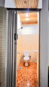 a bathroom with a toilet in a room at Wanasa house in Dahab