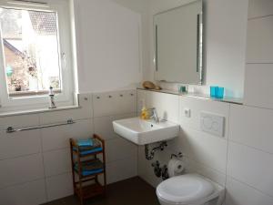 Kylpyhuone majoituspaikassa Apartment Lütte Bris