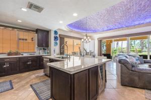 a kitchen with a large island in the middle at Bella Sirena Villa 8 - Your Dream Coastal Escape in Puerto Peñasco