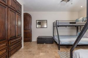 a bedroom with two bunk beds and a closet at Bella Sirena Villa 8 - Your Dream Coastal Escape in Puerto Peñasco +61 photos