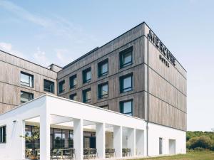 an image of the front of a building at Mercure Quimper Kerlic in Quimper