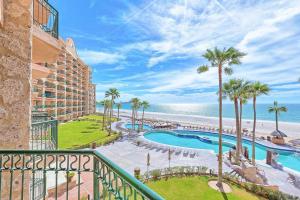 a view of the beach from the balcony of a resort at Sonoran Sea 310-W - Modern 1 bedroom in Puerto Peñasco