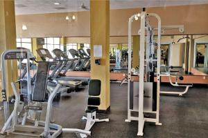 a gym with several treadmills and elliptical machines at Sonoran Spa 304-N in Puerto Peñasco