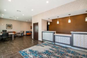 a lobby of a hospital with a waiting room at Executive Inn Fort Worth West in Fort Worth