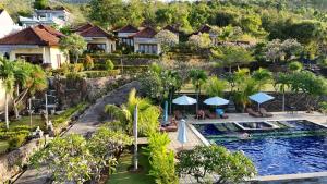 an aerial view of a resort with a swimming pool at Bali Bhuana Villas in Amed
