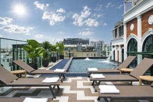 a swimming pool on the roof of a building at Solaria d'Oriente Hotel in Hanoi
