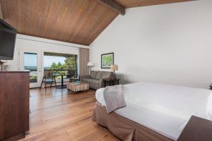 a bedroom with a bed and a living room at Salishan Coastal Lodge by SCP Hotels in Lincoln City +94 photos