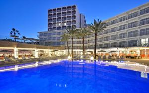 a large swimming pool in front of a building at SOL by Meliá House Mallorca - Adults Only in Magaluf