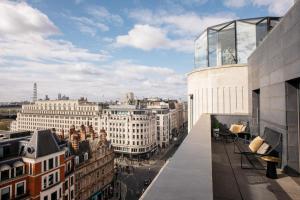 a view of a city from the balcony of a building at ME by Meliá London - Covent Garden in London