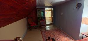 an overhead view of a hallway with a living room at JOSIAH KEITH HOUSE museum & inn in Five Corners +44 photos