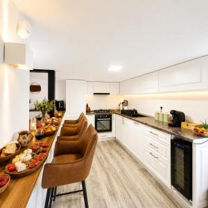 a kitchen with a table with food on it at Wild House in Sinaia