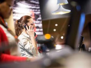 a woman talking on a cell phone at ibis Petrolina in Petrolina