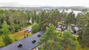 an overhead view of a roof of a house with trees at Helmiapartments Sotkamo in Sotkamo