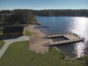 an aerial view of a dock on a lake at Apartament Centrum in Giby