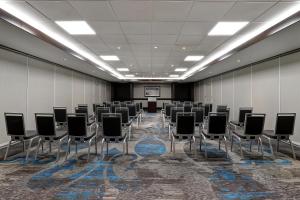 a room with rows of chairs and a podium at Hyatt Regency Niagara Falls Fallsview in Niagara Falls +74 photos