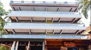 a building with a lot of windows at Hotel Simba by Hakuna in Arambol +27 photos