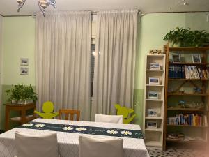 a bedroom with a bed and a book shelf at Big Brother Bed & Rooms in Treviso