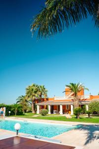 a view of the house from the pool at Bed & Breakfast Villa Michela Alezio in Alezio