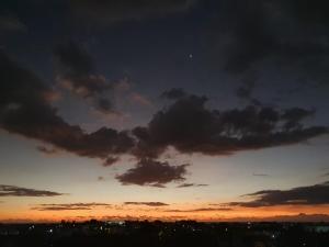 a sunset with a lot of clouds in the sky at Hyacinth Golf& Sea in Grand-Baie +60 photos