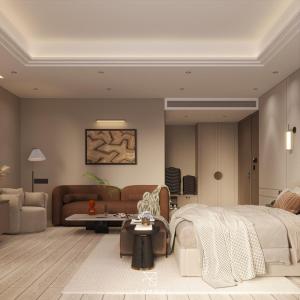 a living room with a bed and a couch at Ananta Elite in Somnath