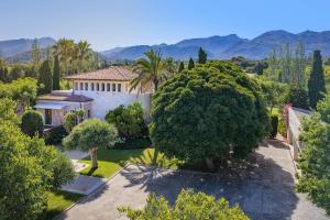 an aerial view of a house with a garden at Finca Playa Llenaire - Can Pou in El Port
