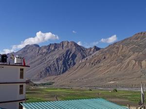 a view of a mountain range from a building at Gyatso Home Saty in Kaza