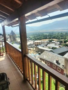 a balcony with a view of a town at Cal Rafalet in Ger