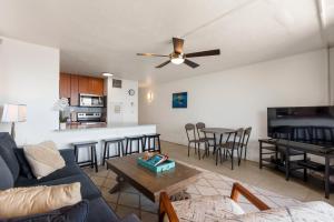 a living room with a couch and a table at SUGAR BEACH RESORT, #235 in Kihei +31 photos