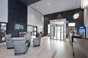 a store with chairs and tables and a lobby at Best Western Plus Moncton in Moncton