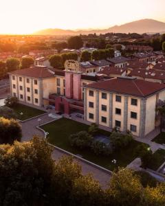 an aerial view of a city with buildings at Grand Hotel del Parco in Stezzano