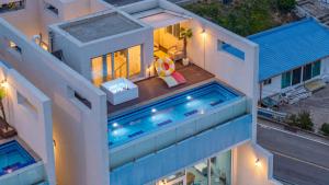 an overhead view of a house with a swimming pool at Yeongdeok The Best Pool Villa in Yŏngdŏk