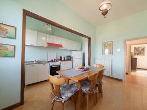 a kitchen with a table and chairs in a room at La Casa dell'Anello - Relax & View - ItalyWeGo in Narni +18 photos