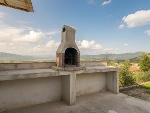 an outdoor oven sitting on top of a building at La Casa dell'Anello - Relax & View - ItalyWeGo in Narni