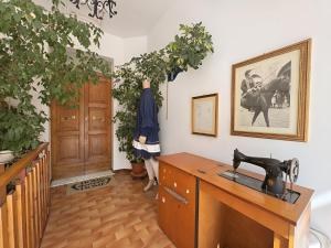 a home office with a desk and some plants at La Casa dell'Anello - Relax & View - ItalyWeGo in Narni