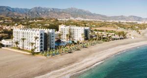 an aerial view of a resort on the beach at Ona Marinas de Nerja Spa Resort in Nerja