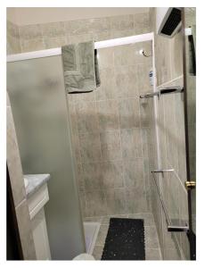 a shower with a glass door in a bathroom at Logis du mont in Saint-Sernin-du-Plain +31 photos
