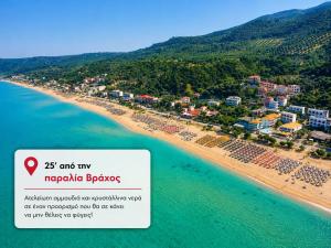 an aerial view of a beach with a resort at Sunset Suite Mytikas in Mytikas