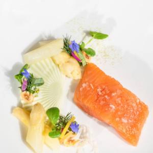 a plate of food with salmon and other foods at 'Gordon' in ApartNest Auchterarder in Auchterarder